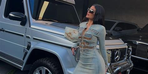 Kylie Jenner Steps Out in Skintight Denim Dress and Matching Bag